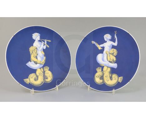 Giovanni Gariboldi (1908-71) for Richard Ginori, a pair of 'Sirene' and 'Tritone' dishes, c.1941, with gilt and blue enamel r