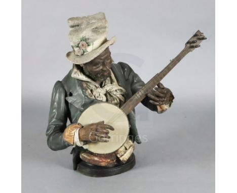 A Goldscheider cold painted terracotta bust of a banjo player, 30in.