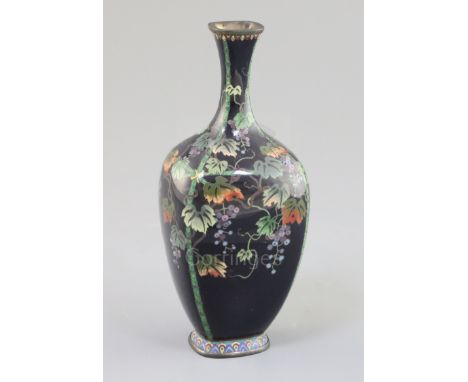 A Japanese silver wire cloisonne enamel vase, Meiji period, decorated with a bamboo trellis trailing with a grape vine, on a 