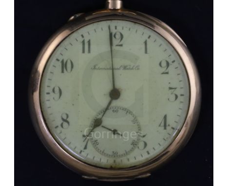 An engine turned 14ct gold International Watch Co open face keyless pocket watch, with Arabic dial and subsidiary seconds.