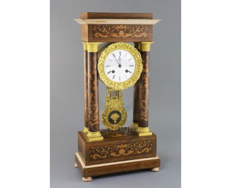A 19th century French ormolu mounted rosewood and marquetry portico clock, height 20.5in.
