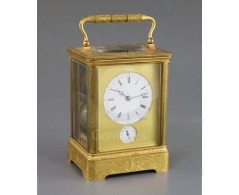 A late 19th century French ormolu hour repeating giant carriage clock, with alarm, with foliate scroll engraved case, enamell