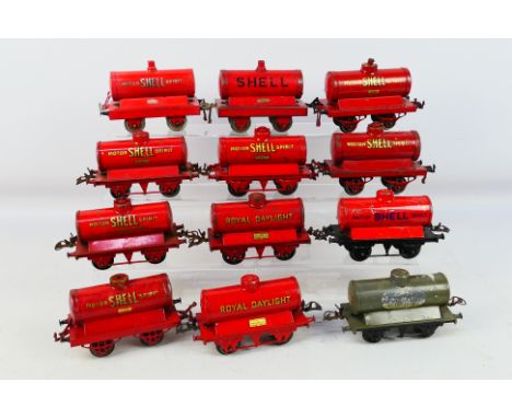 Hornby by Mecanno - twelve early O gauge tin-plate items of rolling stock, all tank wagons, predominantly ShellNational, Powe