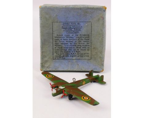 Dinky Toys - A boxed pre-war Dinky Toys #62t Armstrong Whitworth 'Whitley' Bomber. The model in camouflage with yellow rounde