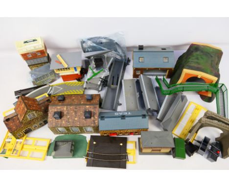 Hornby - A mixed assortment of unboxed platform sections and buildings to include Ramps R464, Straights R460, Car loading Ram