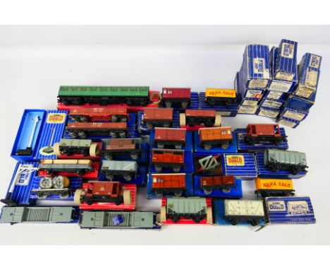 Hornby Dublo - Approximately 40 OO gauge rolling stock to include 4625 20-Ton Bulk grain Wagon, 4670 13- Ton Standard Wagon, 