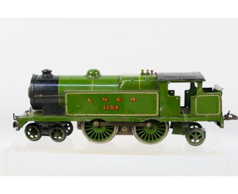 Hornby - A 3 rail 20v electric O gauge 4-4-2T tank engine number 1784 in LNER green livery. The wheels show no signs of crack