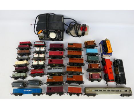 Hornby - A collection of OO gauge items including a 900 series power controller and 36 x wagons and coaches. They show signs 