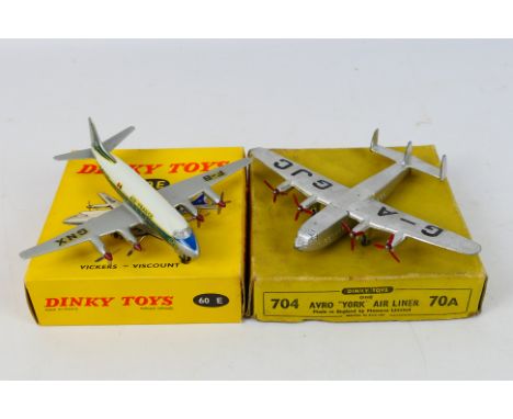 Dinky Toys - French Dinky - Two boxed Dinky Toy model aircraft. Lot consists of Dinky Toys #704 Avro York Airliner 'G-AGJC' i