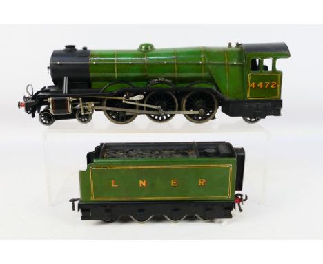 Bassett Lowke - A 3 rail electric O gauge 4-6-2 locomotive number 4472 Flying Scotsman. The model shows signs of age and use 