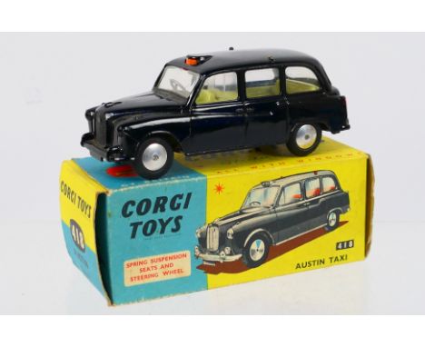 Corgi - A boxed Austin FX4 Taxi # 418. This model appears to be a 'Friday Afternoon Special' as it hasn't been through the se