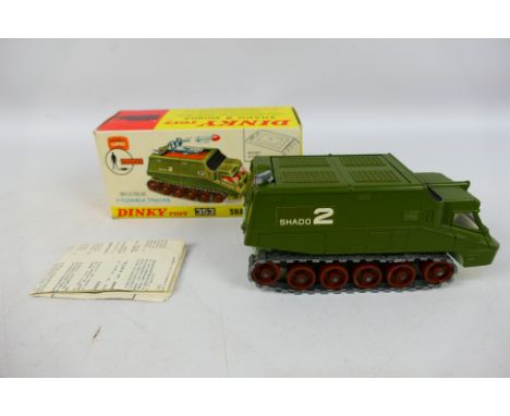 Dinky - A boxed UFO Shado 2 # 353. This version features orange roof panel, white interior, light green base, brown rollers a
