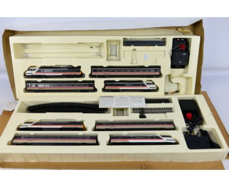 Hornby A pair of incomplete Inter-City train sets. Locos and coaches appear to be in very good condition. The track has signs
