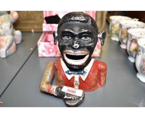 A starkies patient cast metal jolly gent money box, 15cm.
&nbsp;
Notice from the&nbsp;the-saleroom.com:&nbsp;These items are 