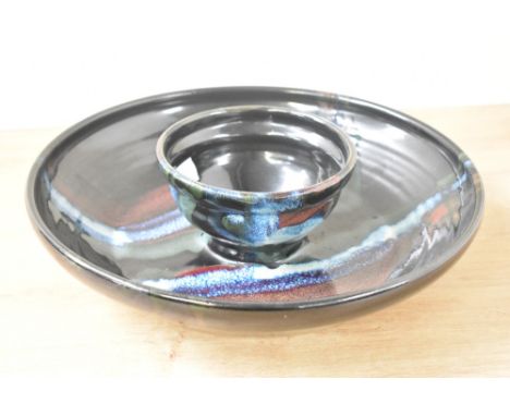 A large chip-in-dip studio ceramic bowl, decorated in a multicoloured glaze, signed to base, 29cm