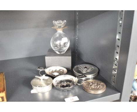 A 20th century bulbous shaped glass perfume bottle with hallmark silver rim and floral style stopper, 12cm, sold together wit