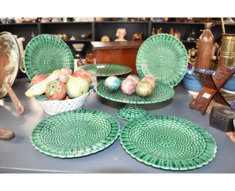 A vintage porcelain fruit bowl, marked to base 'Made in Italy',12cm, sold together with a set of green plates decorated with 