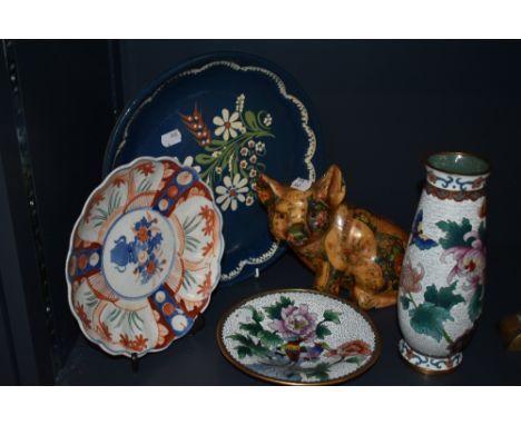 A 20th Century ceramic decoupage pig study, measuring 18cm high, a Cloisonne enamelled vase and dish, a Wetheriggs style blue
