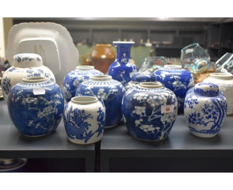 A selection of Chinese pottery ginger and similar style jars, decorated in the crackled ice and prunus pattern, approx. 12 pi