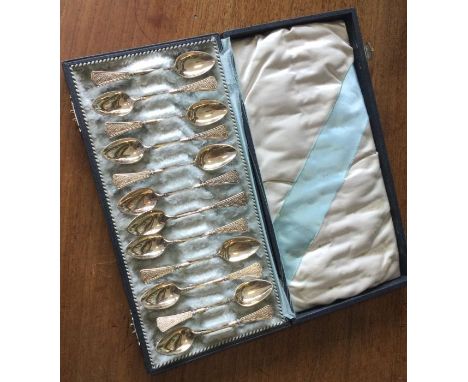 A good cased set of twelve Continental silver teaspoons. Approx. 120 grams. Est. £80 - £120.