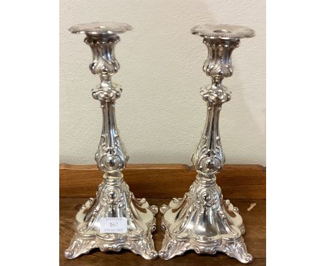A good pair of silver plated candle sticks. Est. £30 - £50.