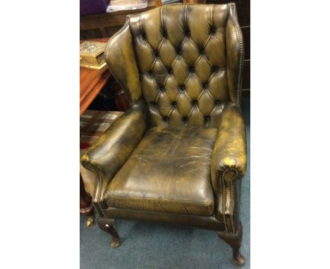 A good leather button back smokers chair. Est. £40 - £60.