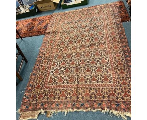 An Antique tapestry rug with floral decoration. Approx. 135cms x 210cms. Est. £60 - £80.