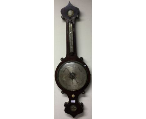 A mahogany banjo barometer. Est. £40 - £60.