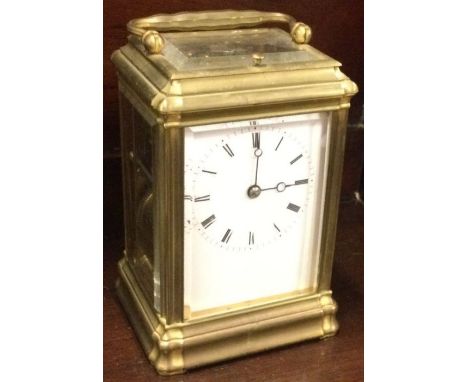 A good brass striking carriage clock with white enamelled dial. Est. £200 - £300.