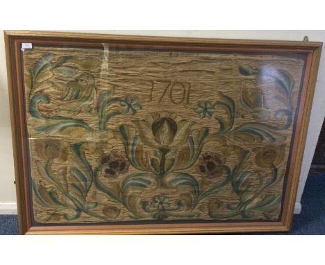 A fine quality early framed and glazed tapestry depicting flowers. Dated 1701. Approx. 120 cms x 84 cms. Est. £700 - £800. 