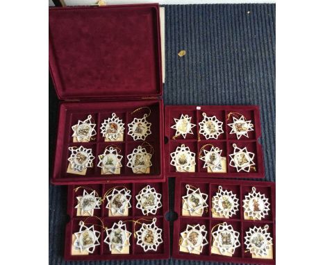 Twenty four boxed Hummel Christmas decorations. Est £30 - £50.