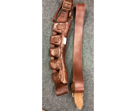 A good quality leather ammunition belt. Est. £20 - £30.