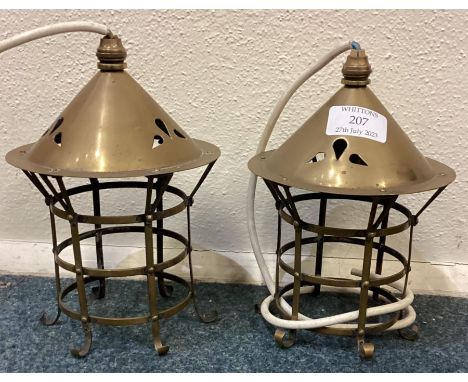A pair of unusual brass light fittings with domed tops. Est. £30 - £50.