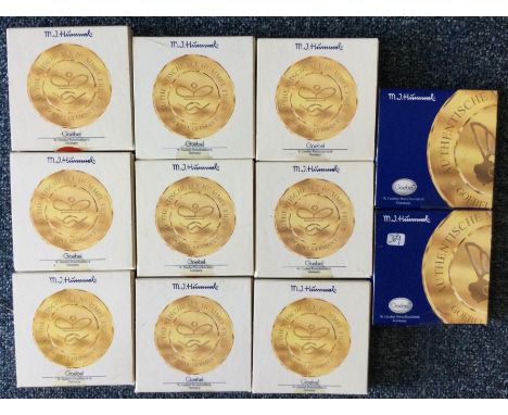 Eleven boxed Hummel dishes. Est. £20 - £30.
