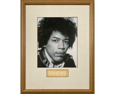 A page (4.5 x 13.3cm) signed by Jimi Hendrix and with inscription "Love Always To Jan, Jimi Hendrix'. Mounted, framed and gla