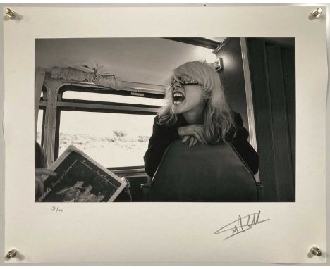 A high-quality photo print of an image by Martyn Goddard depicting Debbie Harry of Blondie on a tour bus, travelling to Phila
