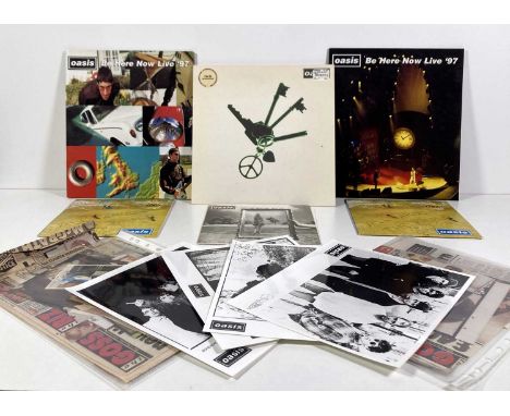 Oasis ephemera to inc: Let There Be Love (RKID32, VG+/VG+ with some light scuffs and marks), Wonderwall/Round Are Way (CRE215