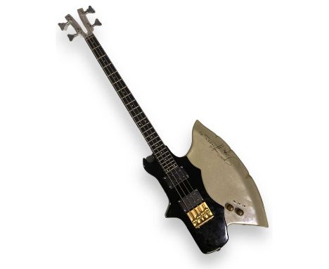 A Kramer Axe bass guitar, serial no: A4602 with 'Badass Bass' tailpiece. Signed and numbered under finish 'Gene Simmons 81 25