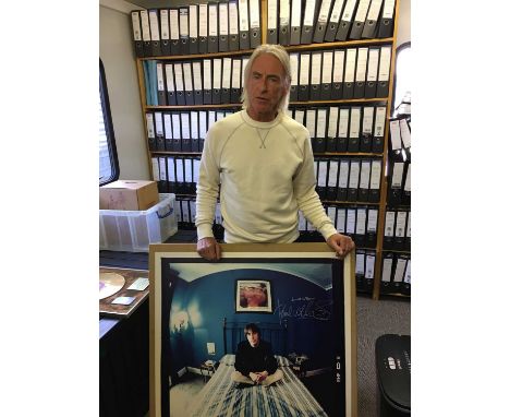 A large format photo print onto thick stock, affixed to canvas, depicting Paul Weller as photographed by Laurence Watson. Sig