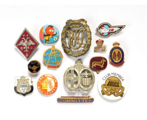 MISCELLANEOUS BADGES. Fourteen badges including Corgi & Tri-ang Toys, German sports badge etc.  Please note that all items in