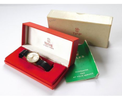 ROLEX TUDOR. A late 1960's rolled gold presentation Rolex Tudor Royal wristwatch. The reverse of the case with presentation 5
