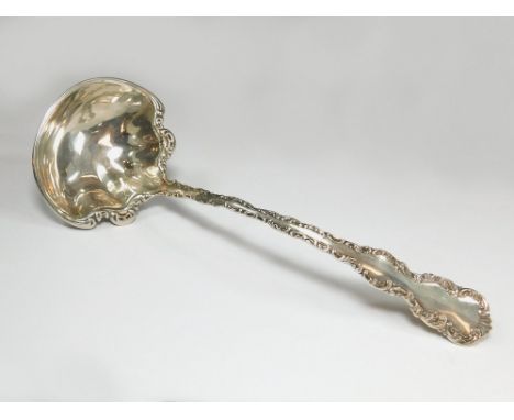 PUNCH BOWL LADLE. A Sterling silver punch bowl ladle. Length 26cm.  Please note that all items in this auction are previously