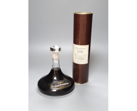 A bottle of 1976 Dupeyron Armagnac Millesime and a decanter bottle of Porto Dom Joaquim Reserva (2)
