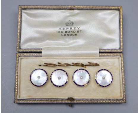 A cased set of four early 20th century 9ct, mother of pearl and enamel buttons, in Asprey box.
