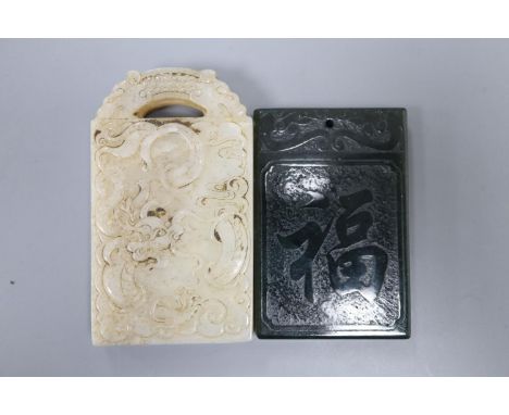 A Chinese white and russet jade 'dragon' plaque and a spinach green jade plaque, 6.2 - 7.3cm