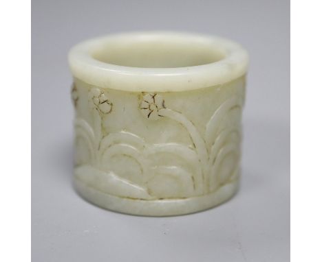 A Chinese pale celadon jade archer's thumb ring