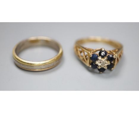 A Middle Eastern three colour metal ring and 9ct gold gem set ring, gross 2 grams.