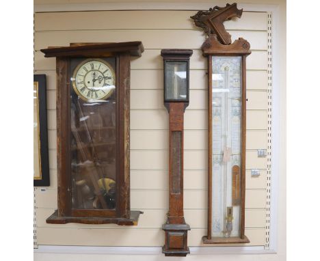 A Negretti and Zambra oak stick barometer, an admiral fitzroy barometer, a german wall clock - restoration needed