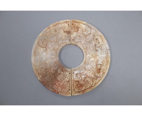 A pair of Chinese archaistic white and russet jade plaques, Huang