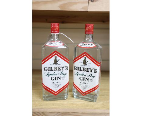 Two bottles of Gilbey's Gin